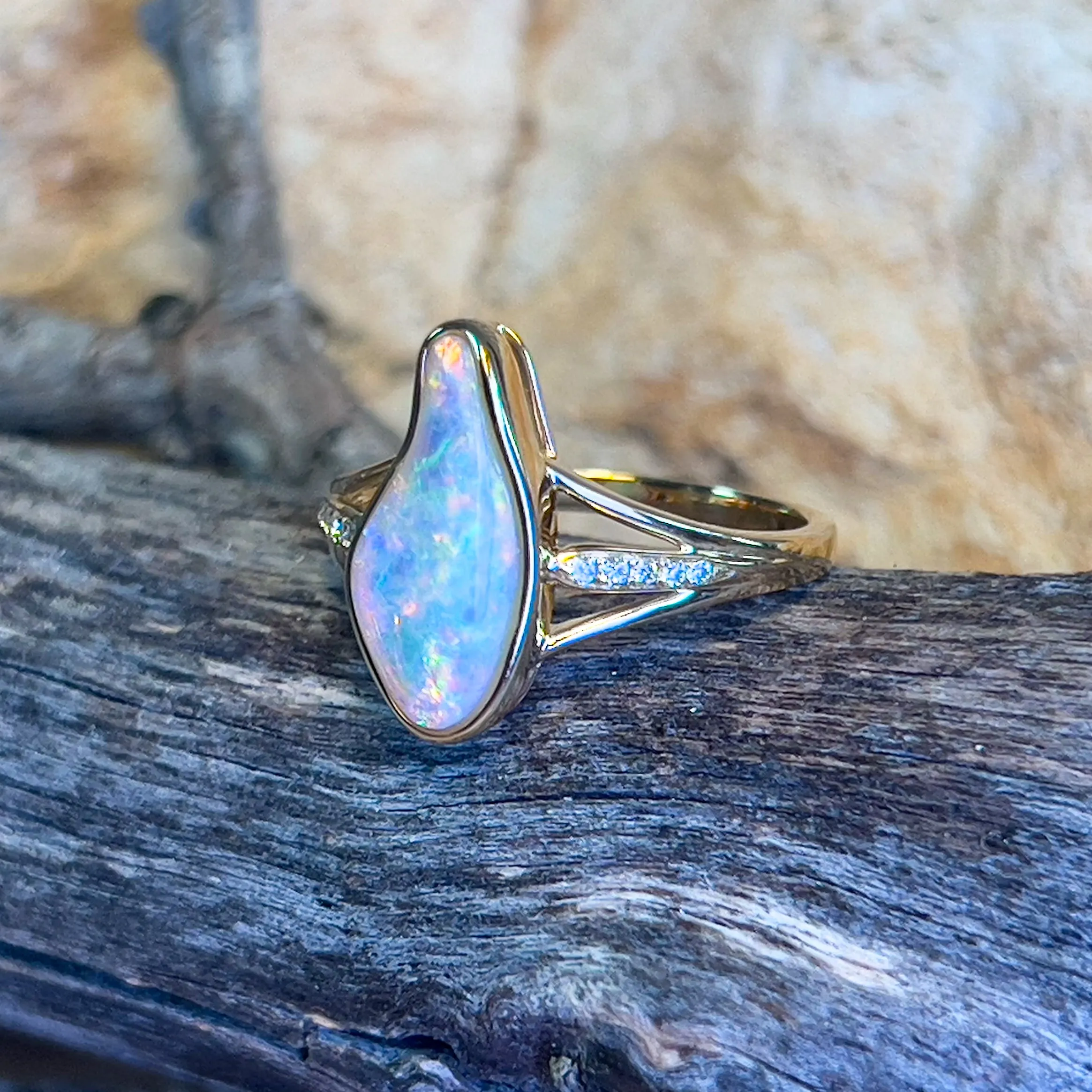 18kt Yellow gold 1.1ct freeform Opal and diamond ring