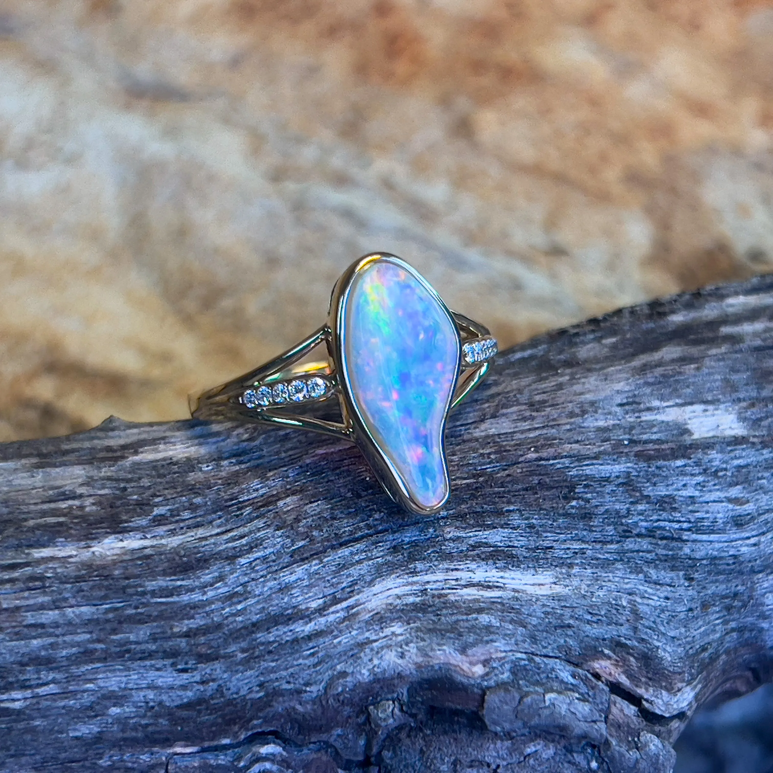 18kt Yellow gold 1.1ct freeform Opal and diamond ring