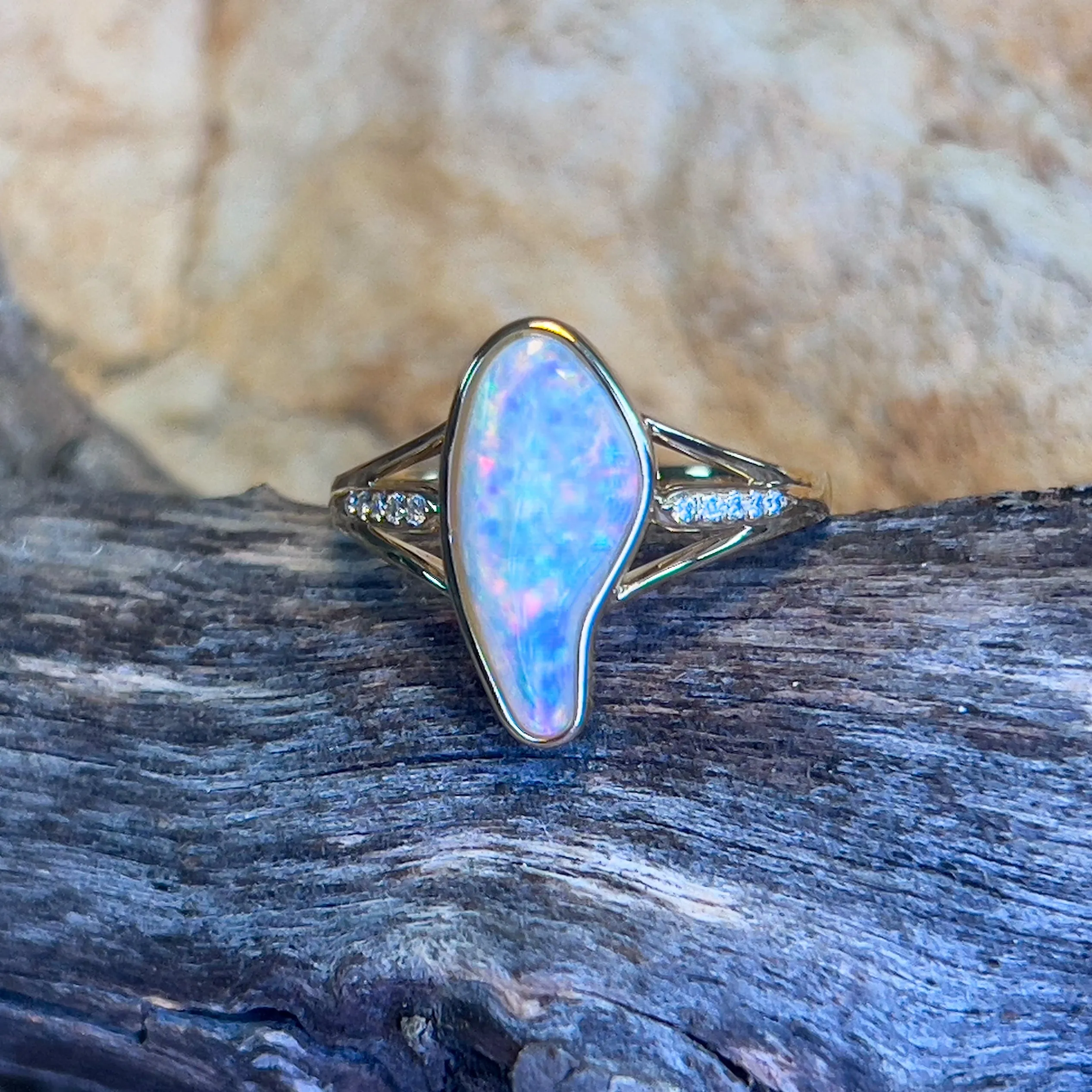 18kt Yellow gold 1.1ct freeform Opal and diamond ring