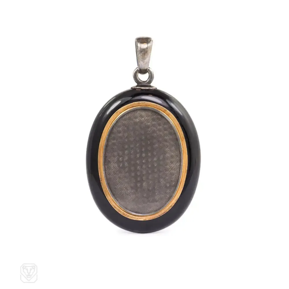 Antique onyx and diamond locket