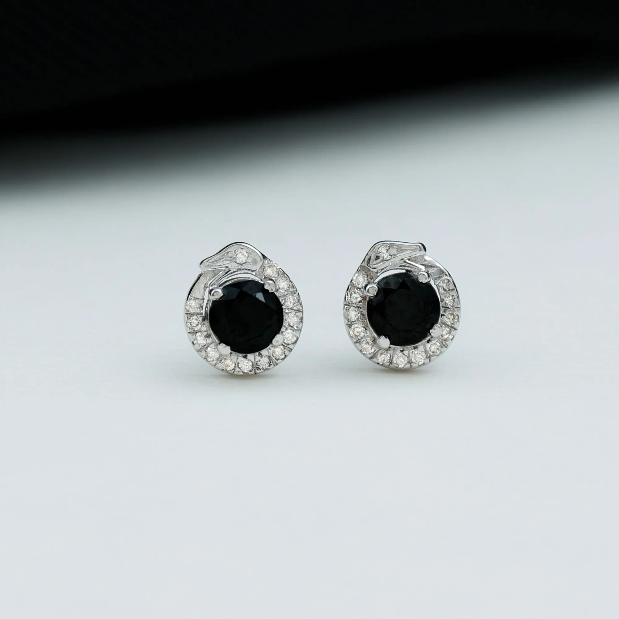 Black and White Diamond Snake Stud Earrings in Claw Set