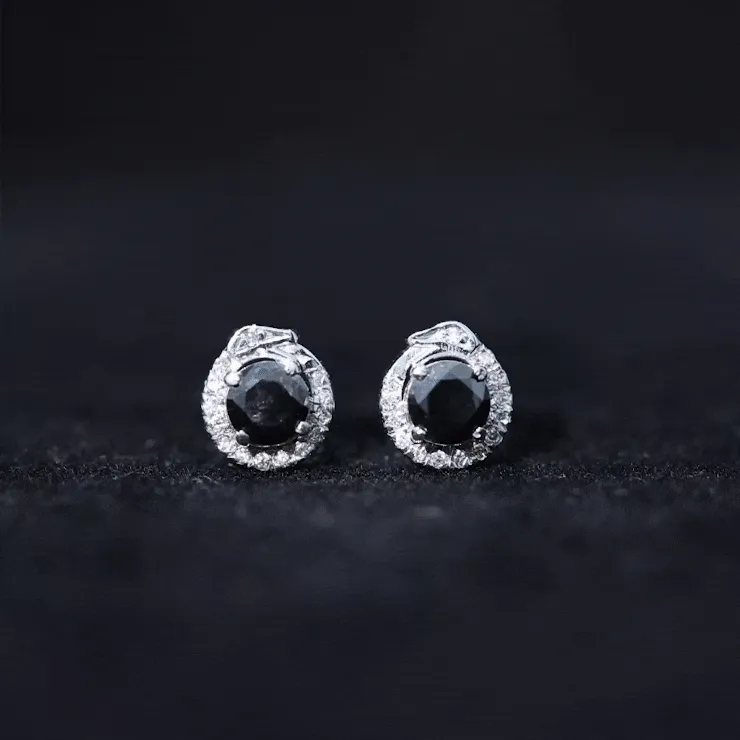 Black and White Diamond Snake Stud Earrings in Claw Set