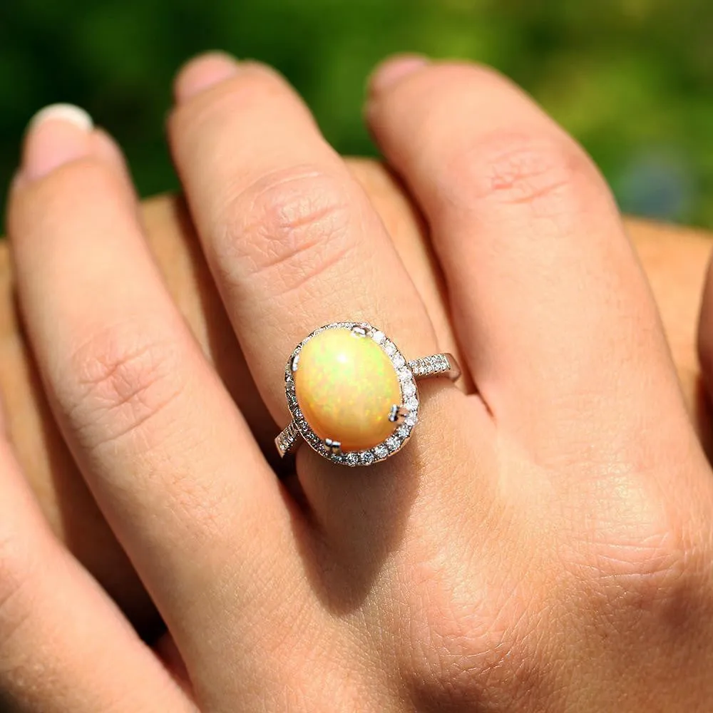 Oval Opal Halo Ring with Diamond Accents 18K 5.50ctw